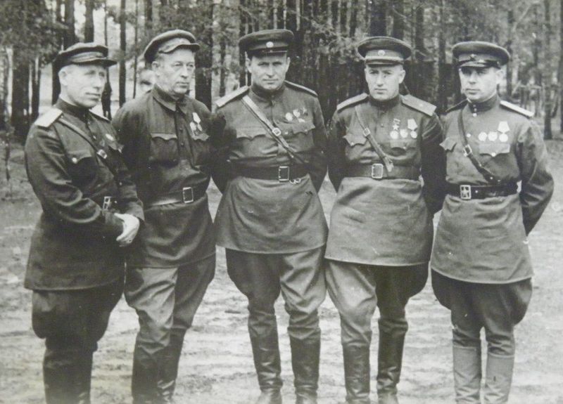 Д.С.Коротченко (второй слева)